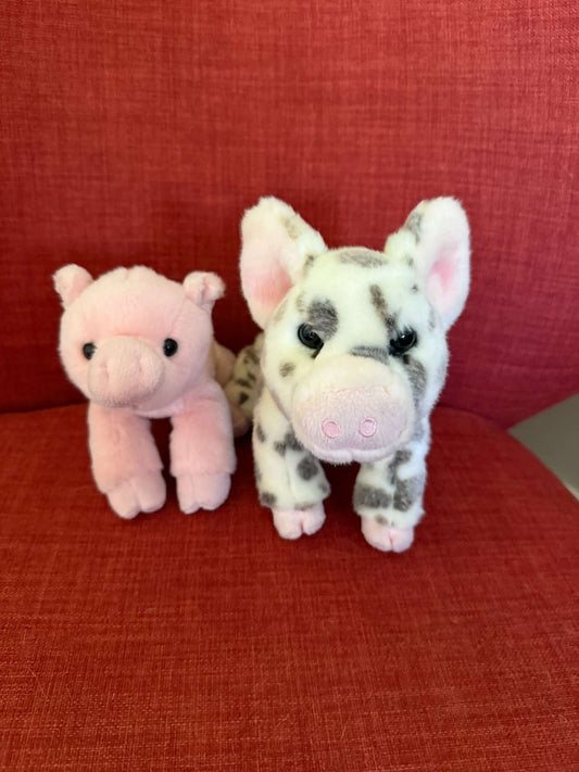 Two piggie plushes