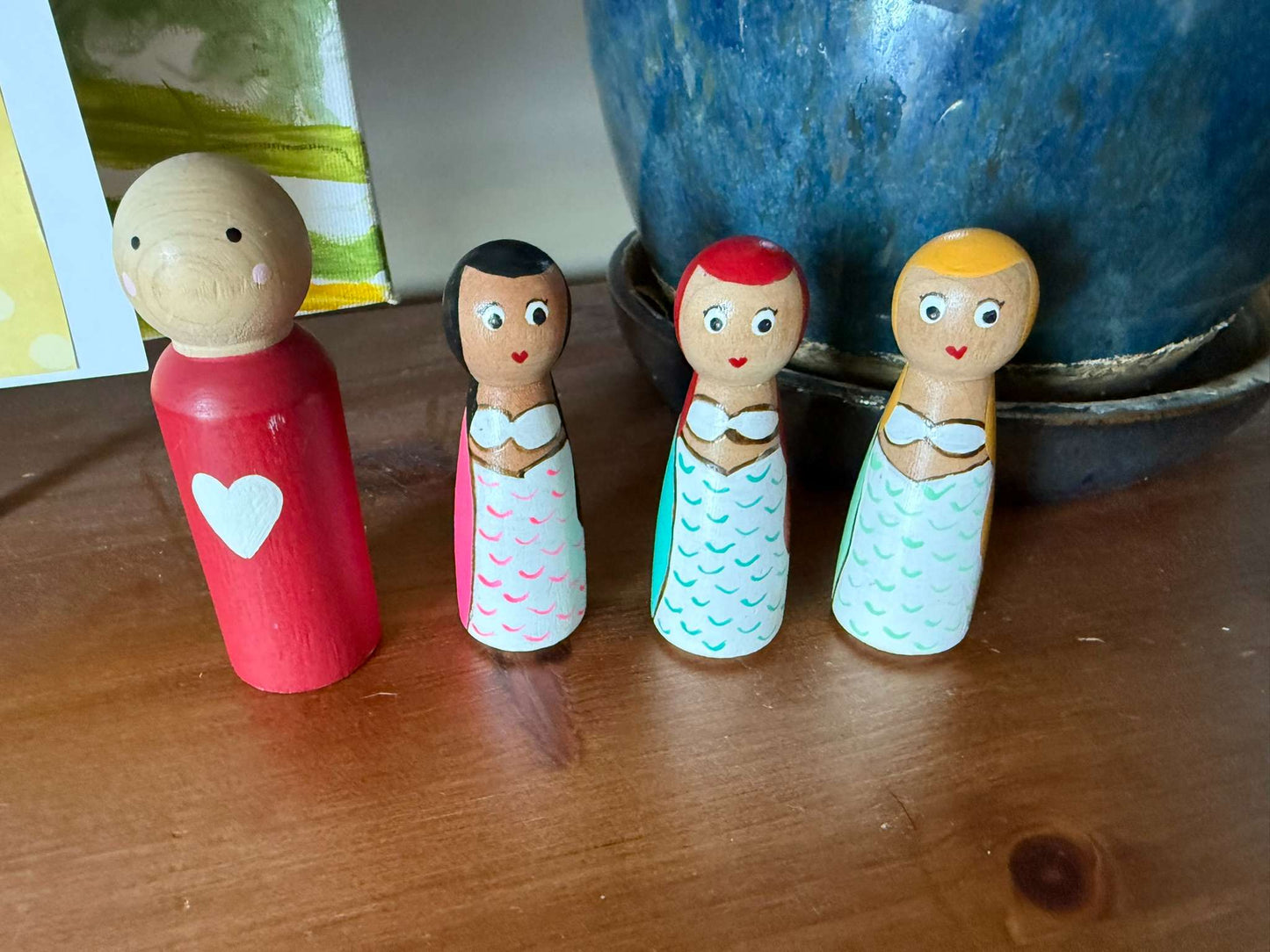 Hand-painted wooden peg dolls
