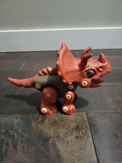 Assembling Jurassic Dinasour building toy