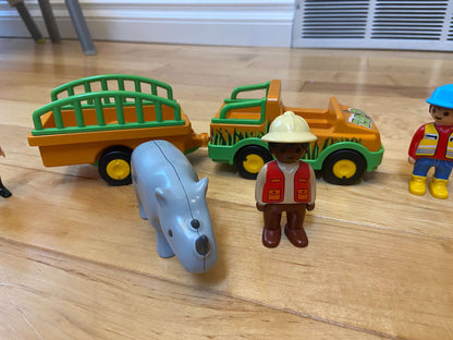 Playmobil Set with 17 People, a Rhino, And Zookeeper Vehicle/Trailer