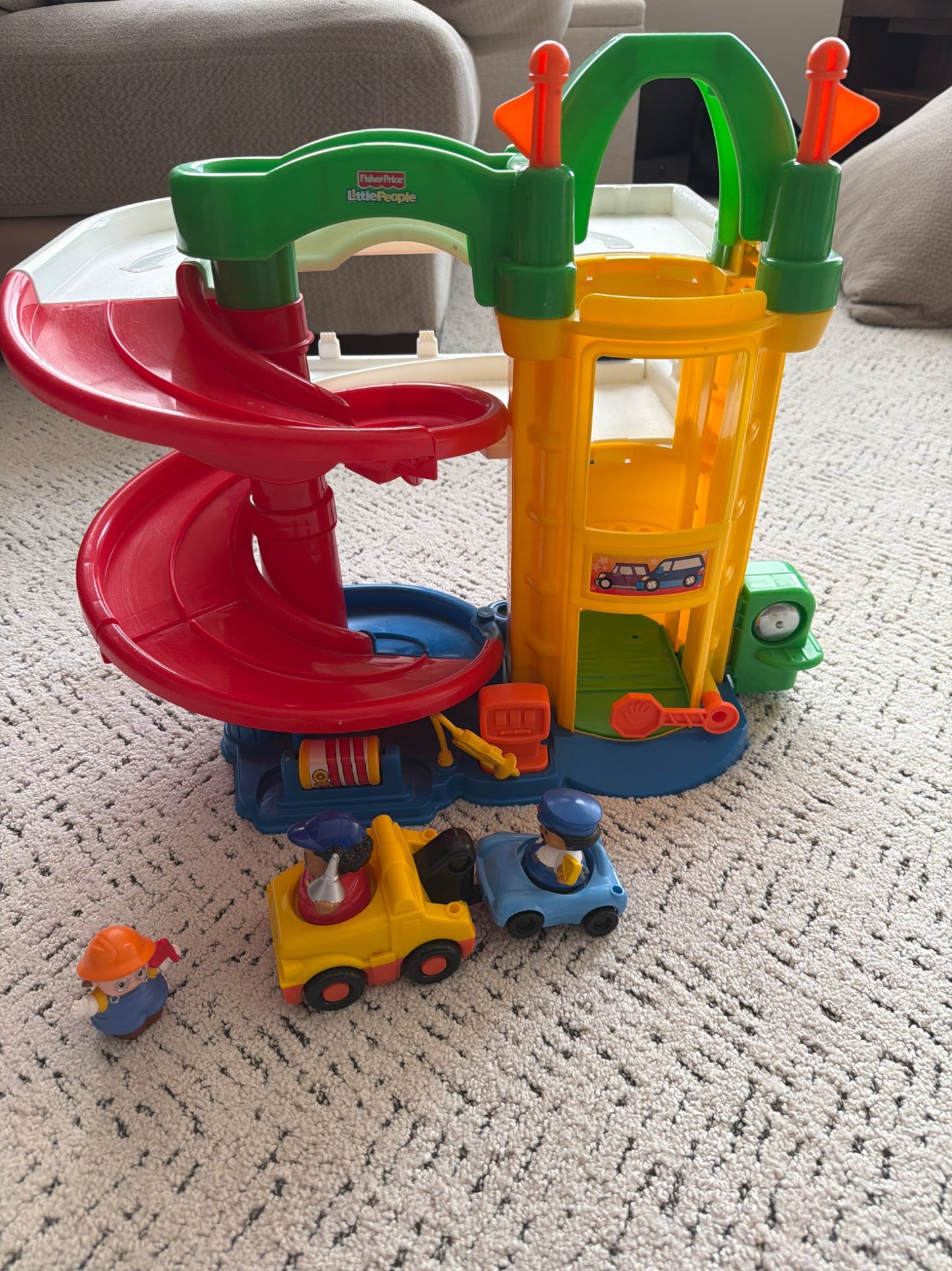 Little people large  parking garage with car elevator and cars