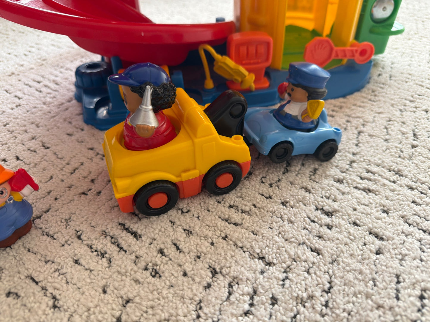 Little people large  parking garage with car elevator and cars