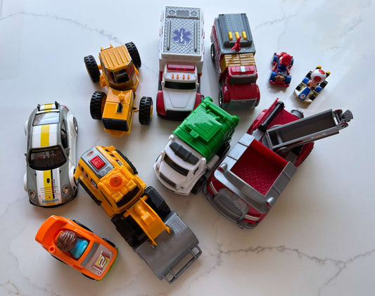 Toy car lot; tractor, firetruck, ambulance