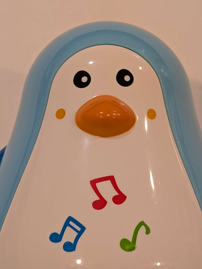 Hape Musical Penguin Wobbler, MSRP $30