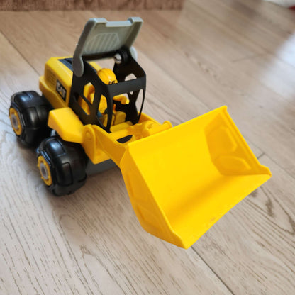 Toy construction trucks