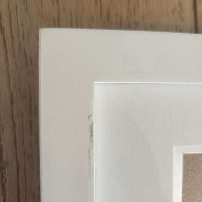 First prints frame, white