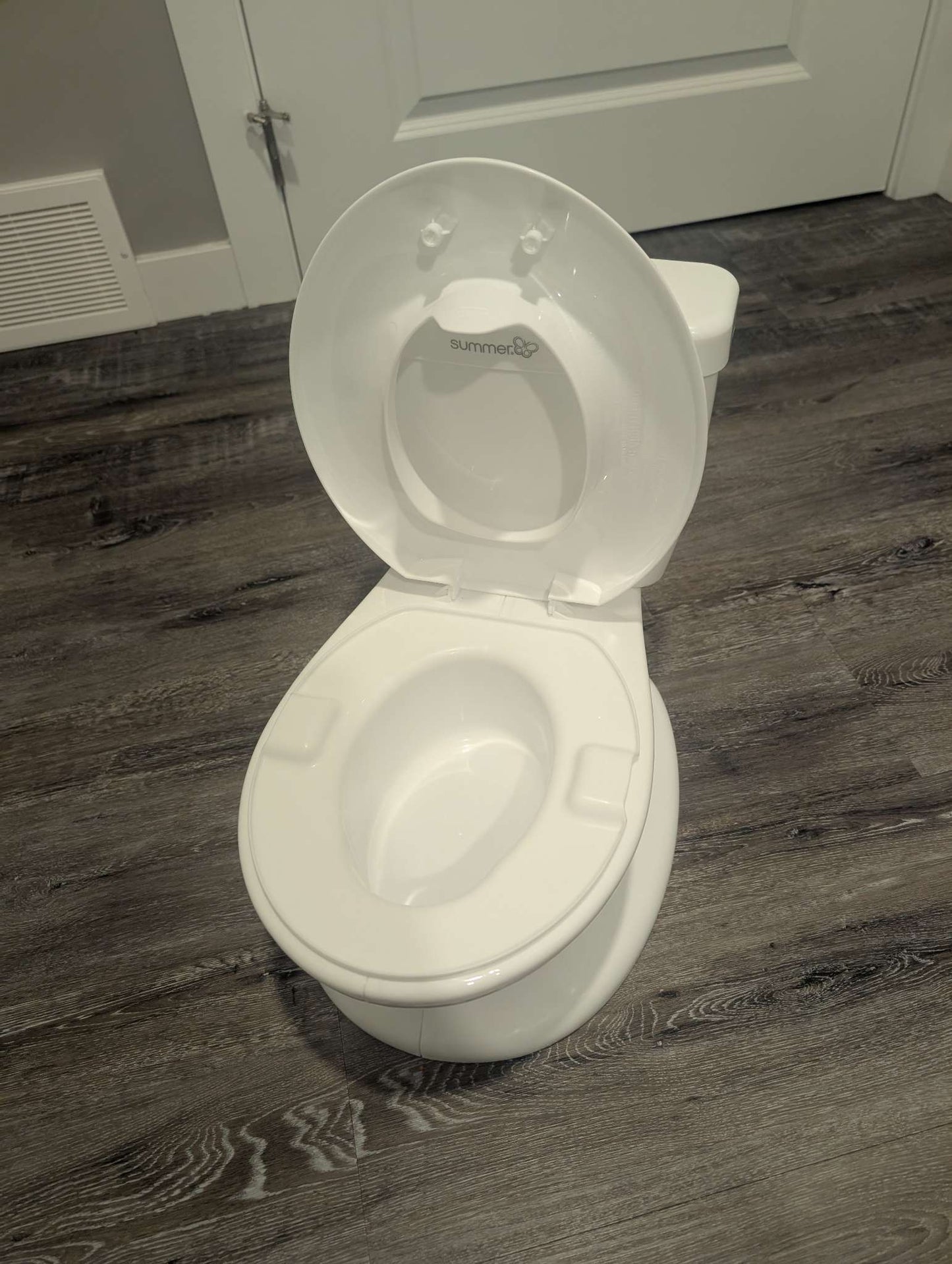 Summer Infant White Potty with Flushing Sound. MSRP $40