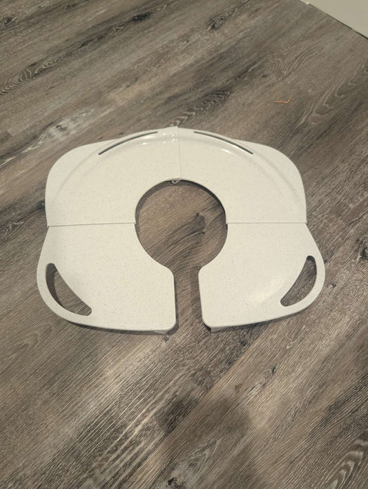 Primo Baby Folding Potty Seat with Handles.