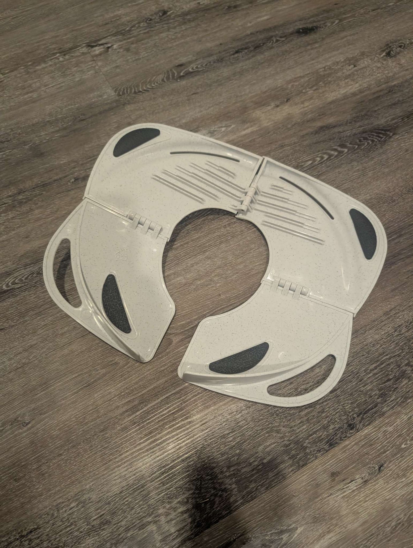 Primo Baby Folding Potty Seat with Handles.
