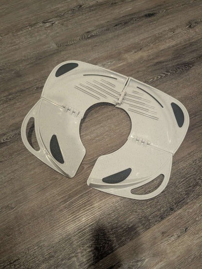 Primo Baby Folding Potty Seat with Handles.