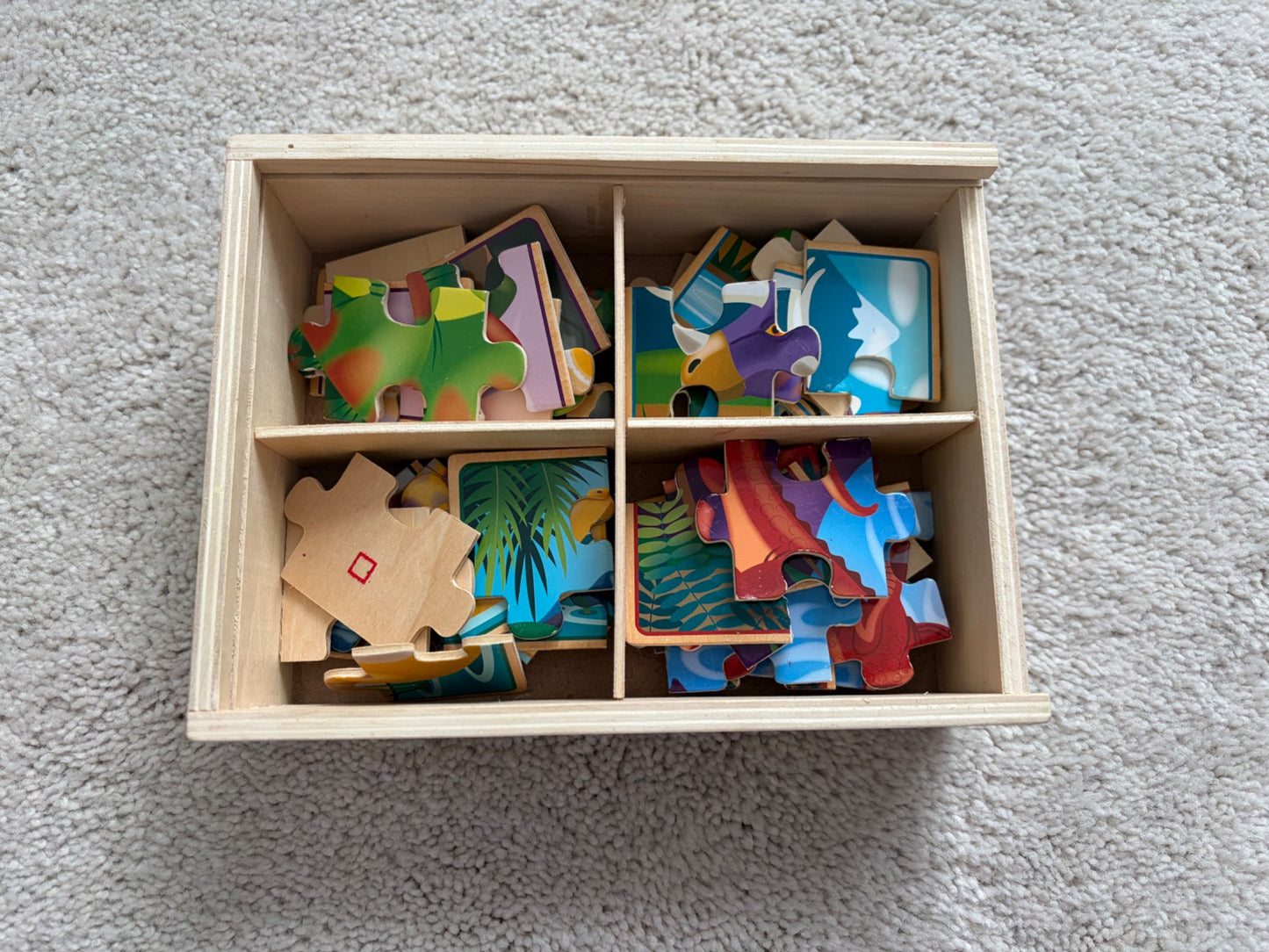 Melissa + Doug 4-in-1 Wooden Dino Puzzles *writing on box*