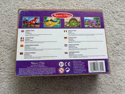 Melissa + Doug 4-in-1 Wooden Dino Puzzles *writing on box*