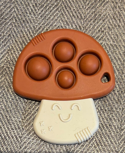 Itzy ritzy mushroom teether and fidget toy