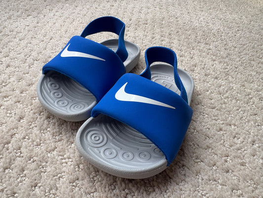 Nike - blue slide sandals with ankle strap, size 6, retail $40, Shoes 6 (Walkers:12-24 mth)