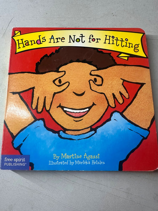 Hands are not for hitting board book