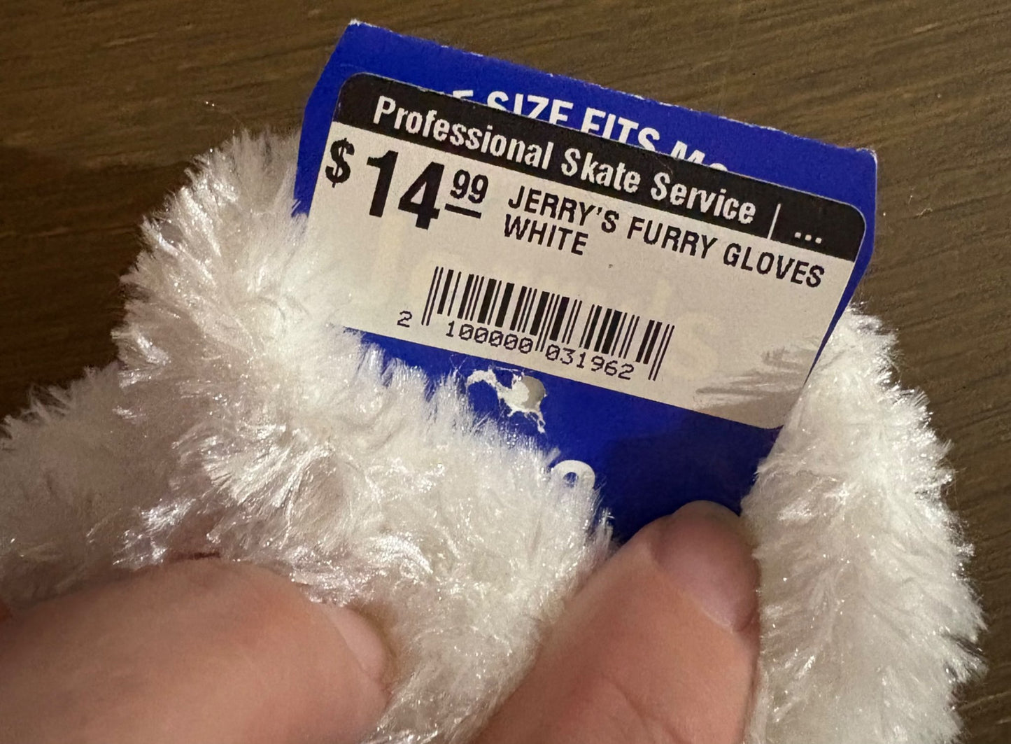 Stretchy, shiny, furry white gloves. BNWT. Retails at $14.99