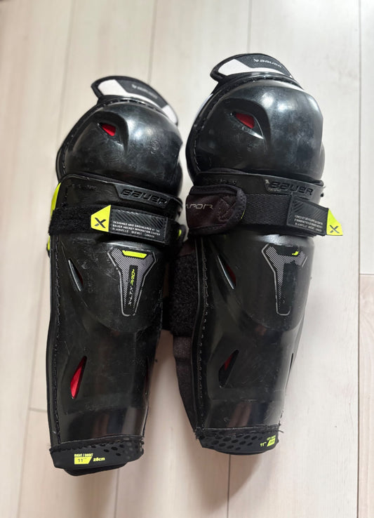 Hockey shin pads 11”- Bauer (retail new approx $100)