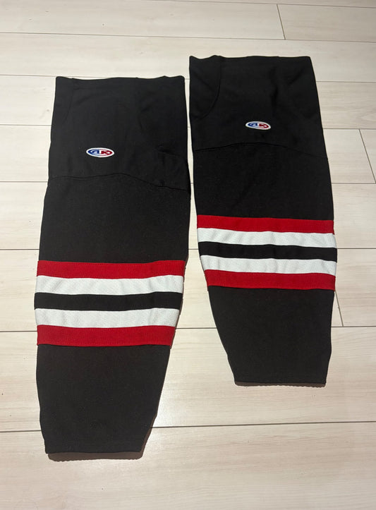 Black hockey socks with red/white stripes