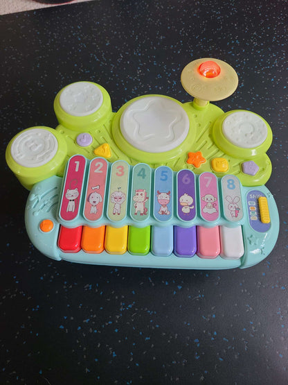 Piano, drum, xylophone set- MSRP $60