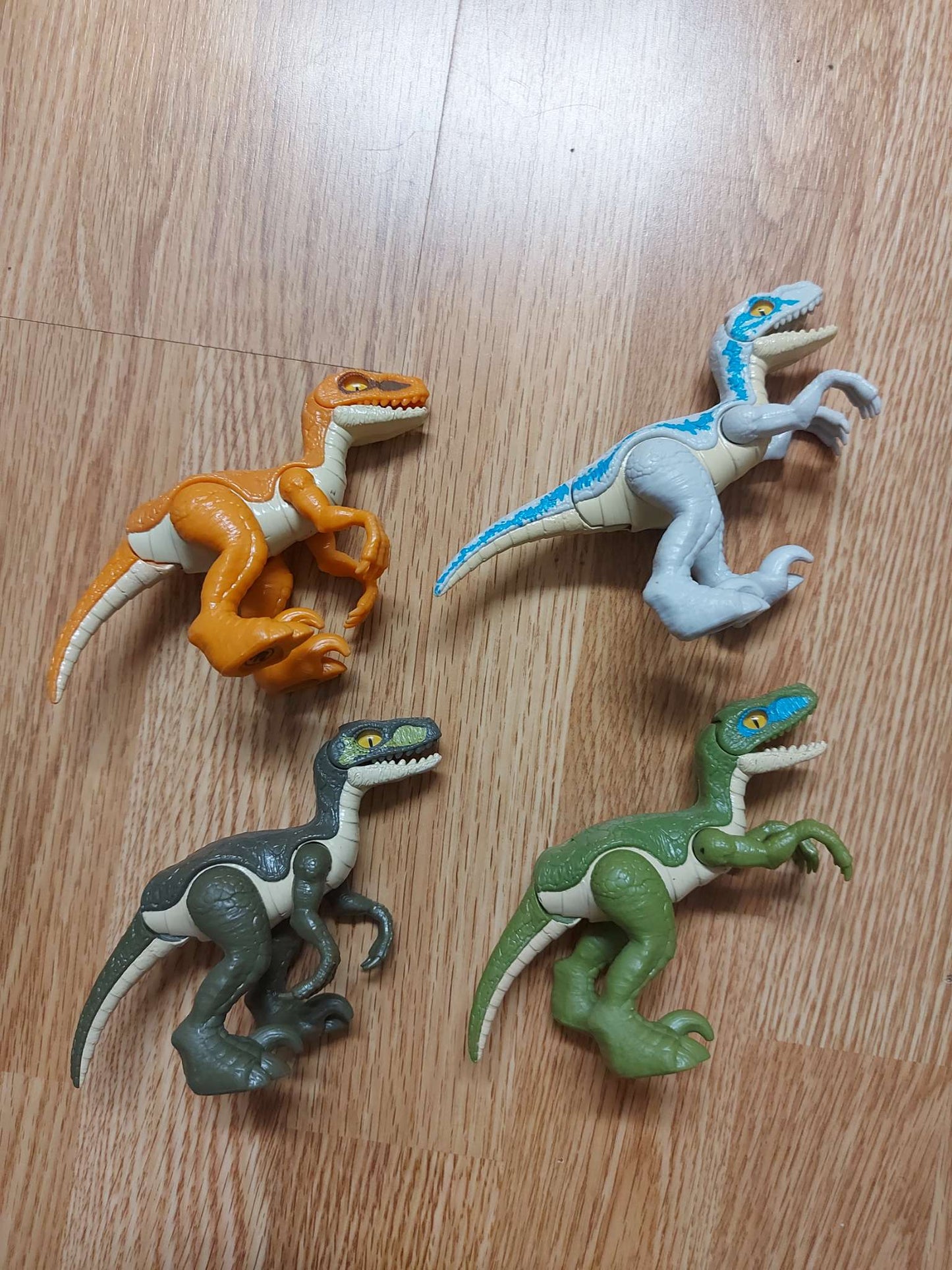 Lot of 4 raptors dinosaurs