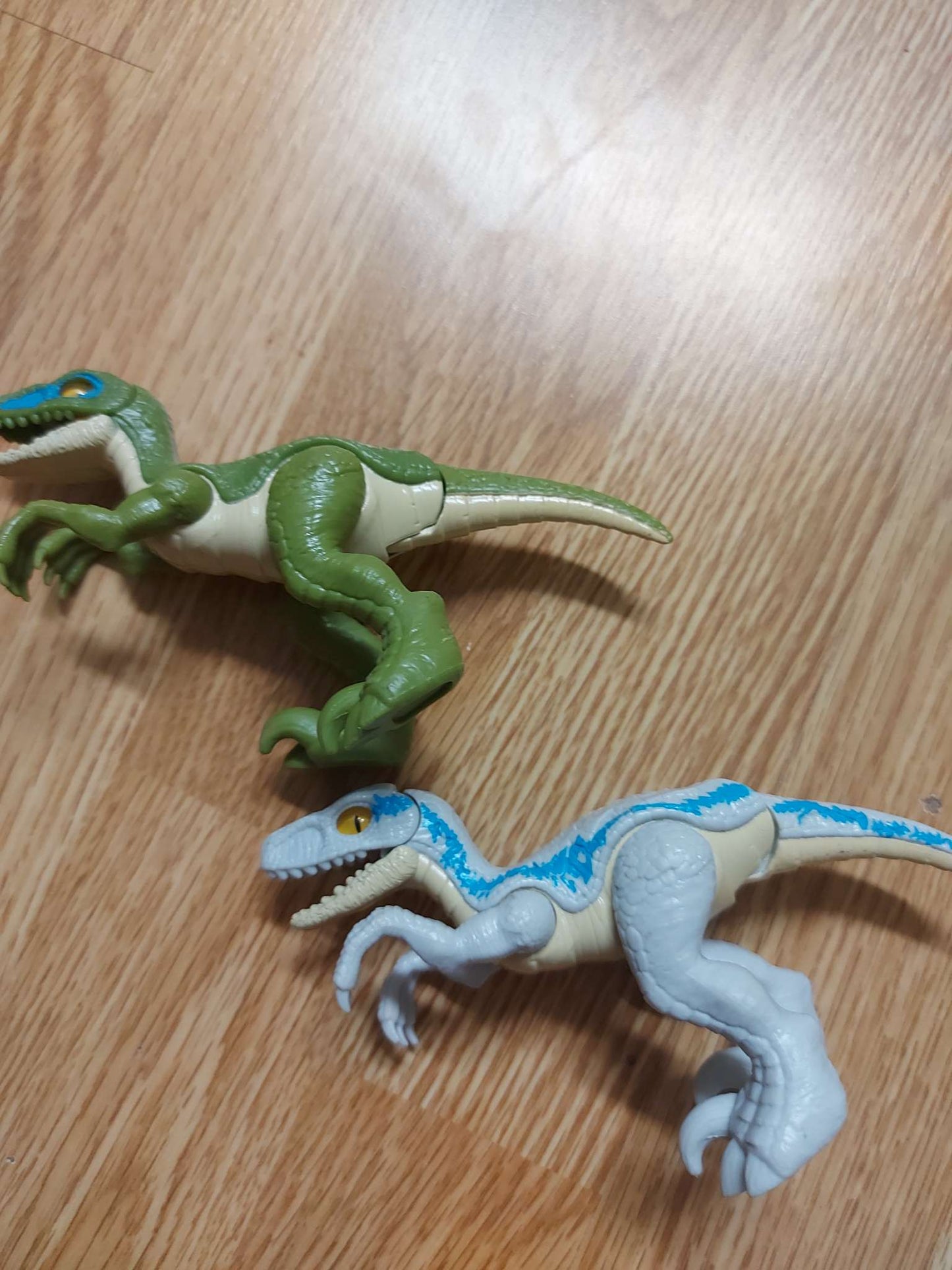 Lot of 4 raptors dinosaurs