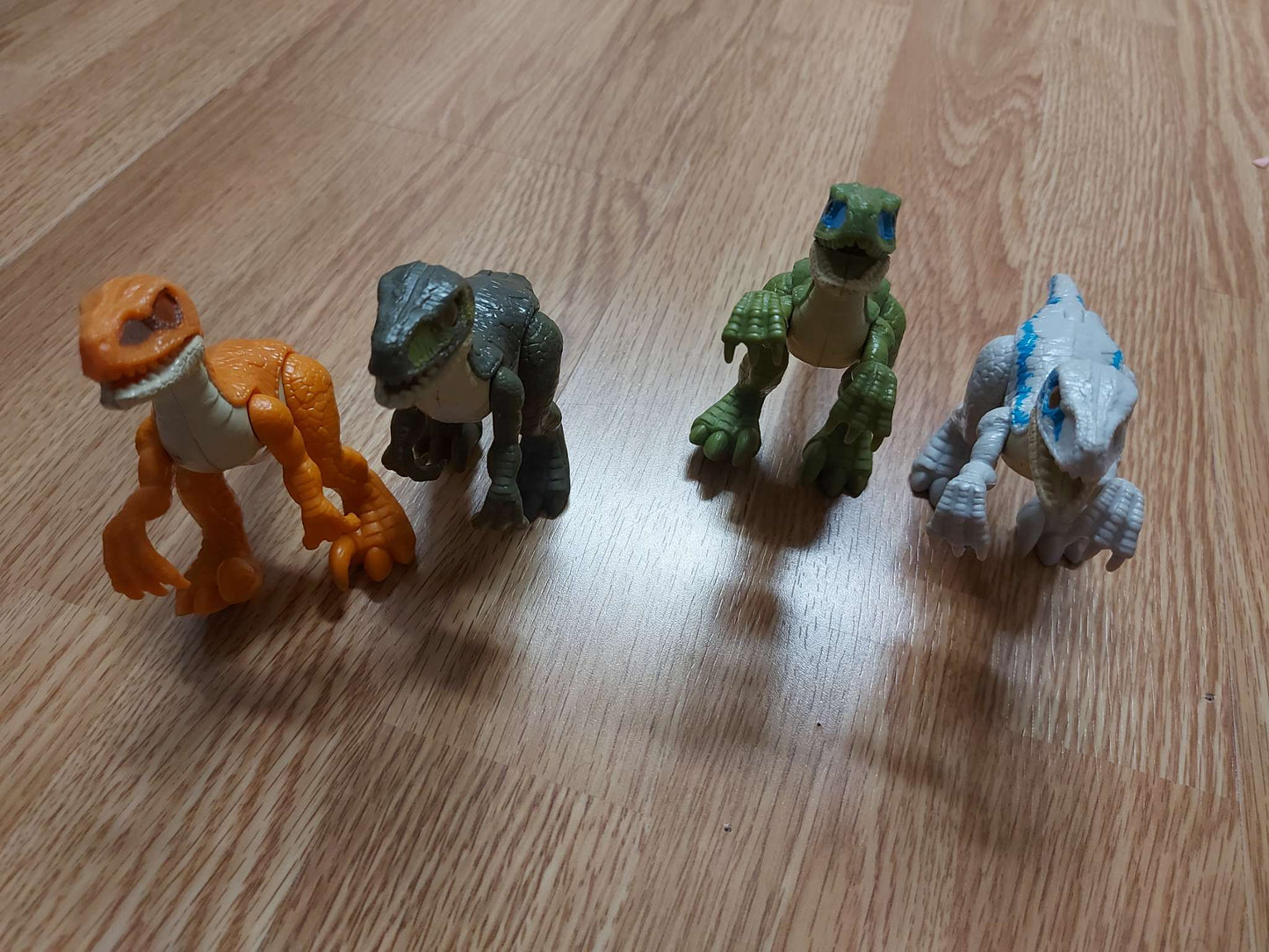 Lot of 4 raptors dinosaurs