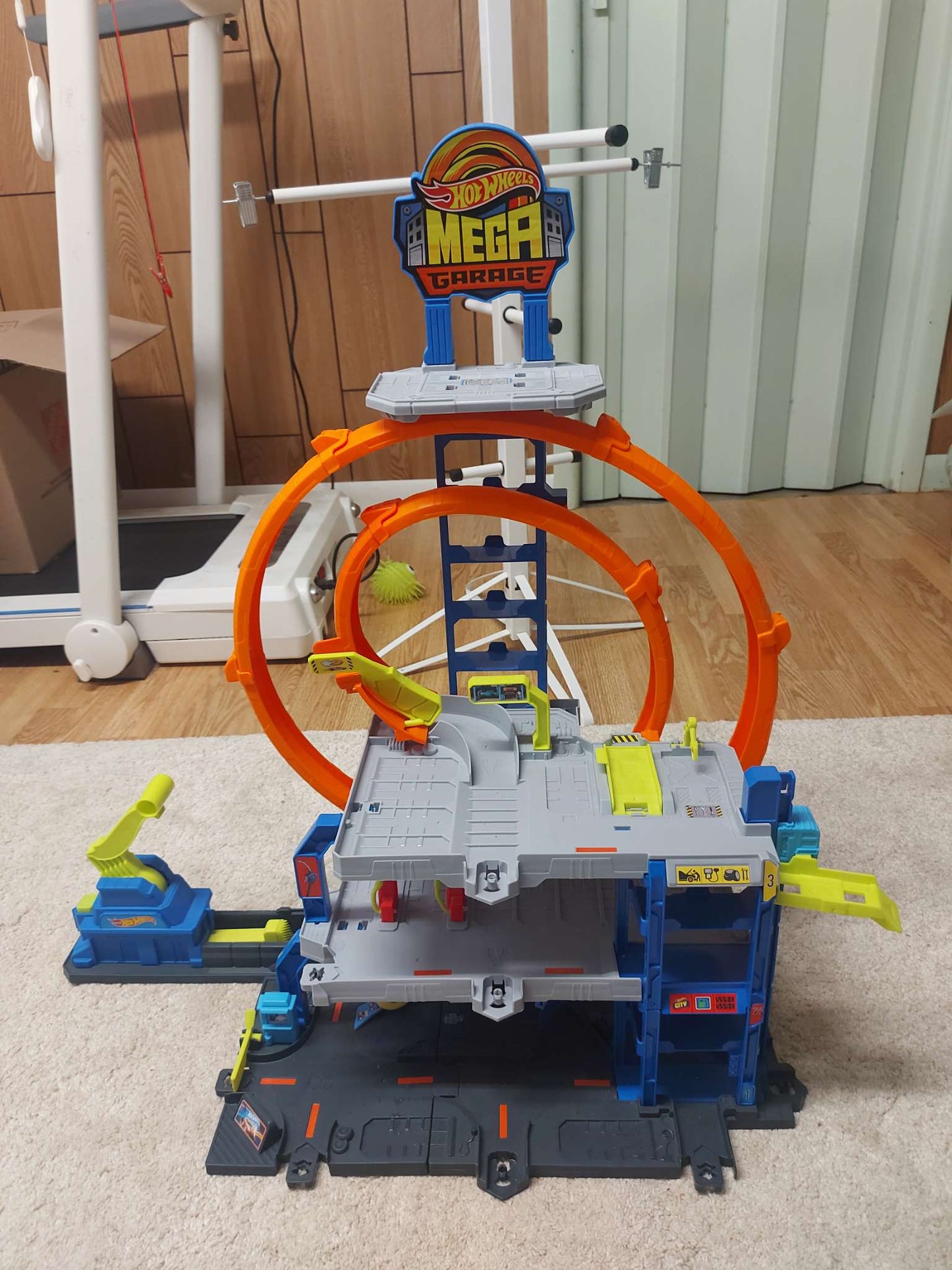 Hot Wheels Mega Loop Garage Track Set with Toy Car & Helicopter (Retails for 80$)