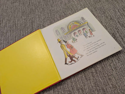 2 large Curious George storybooks