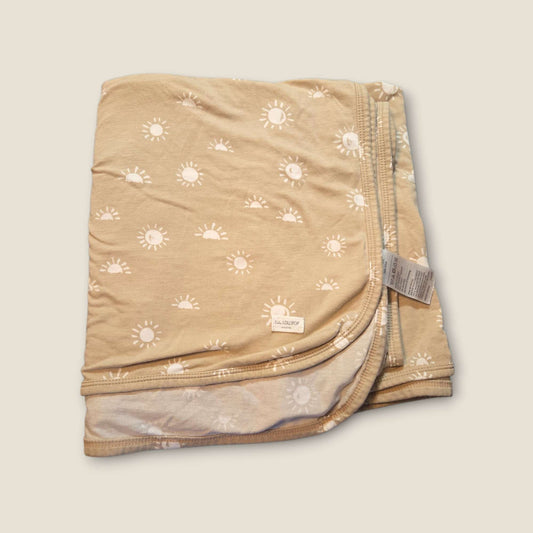 Lululollipop stretch brown rainbow blanket retails $35