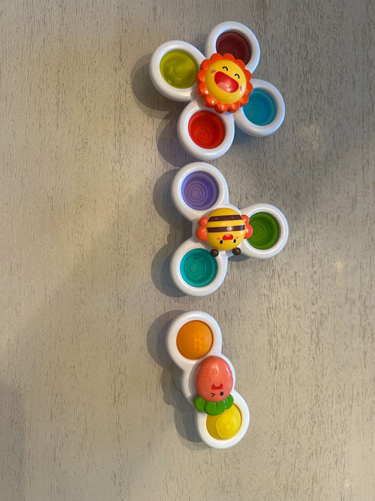 Suction cup spinner toys