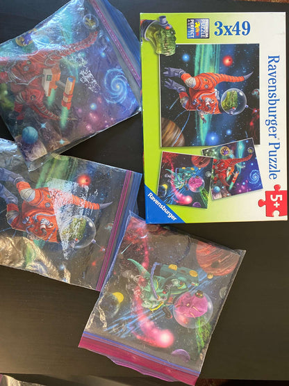 Ravensburger set of 3 puzzles - "Dinosaurs in Space"