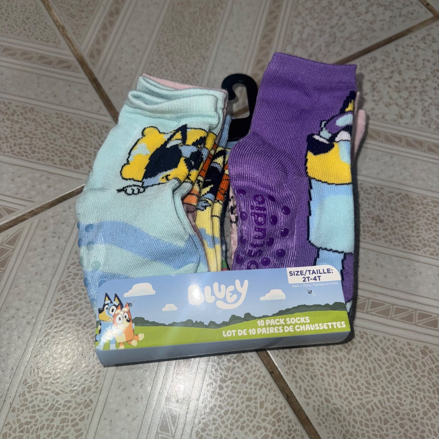 Bluey hat/mitt set and new pack of socks size 2-4