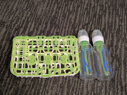 Dr. Brown's dishwasher basket and two narrow 8oz glass bottles