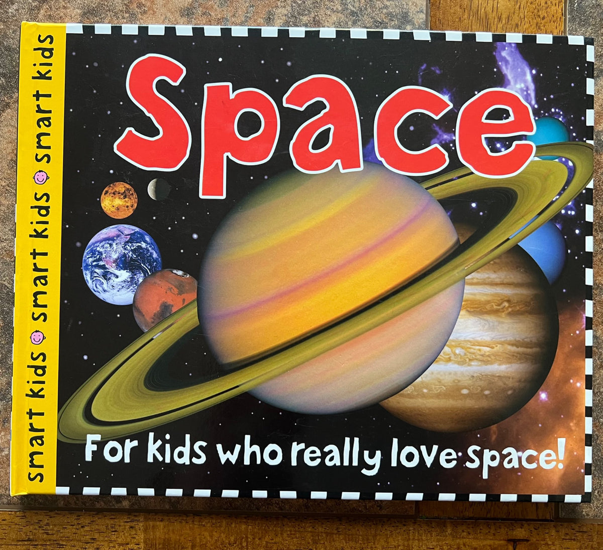 Two hardcover science books - space and dinosaurs