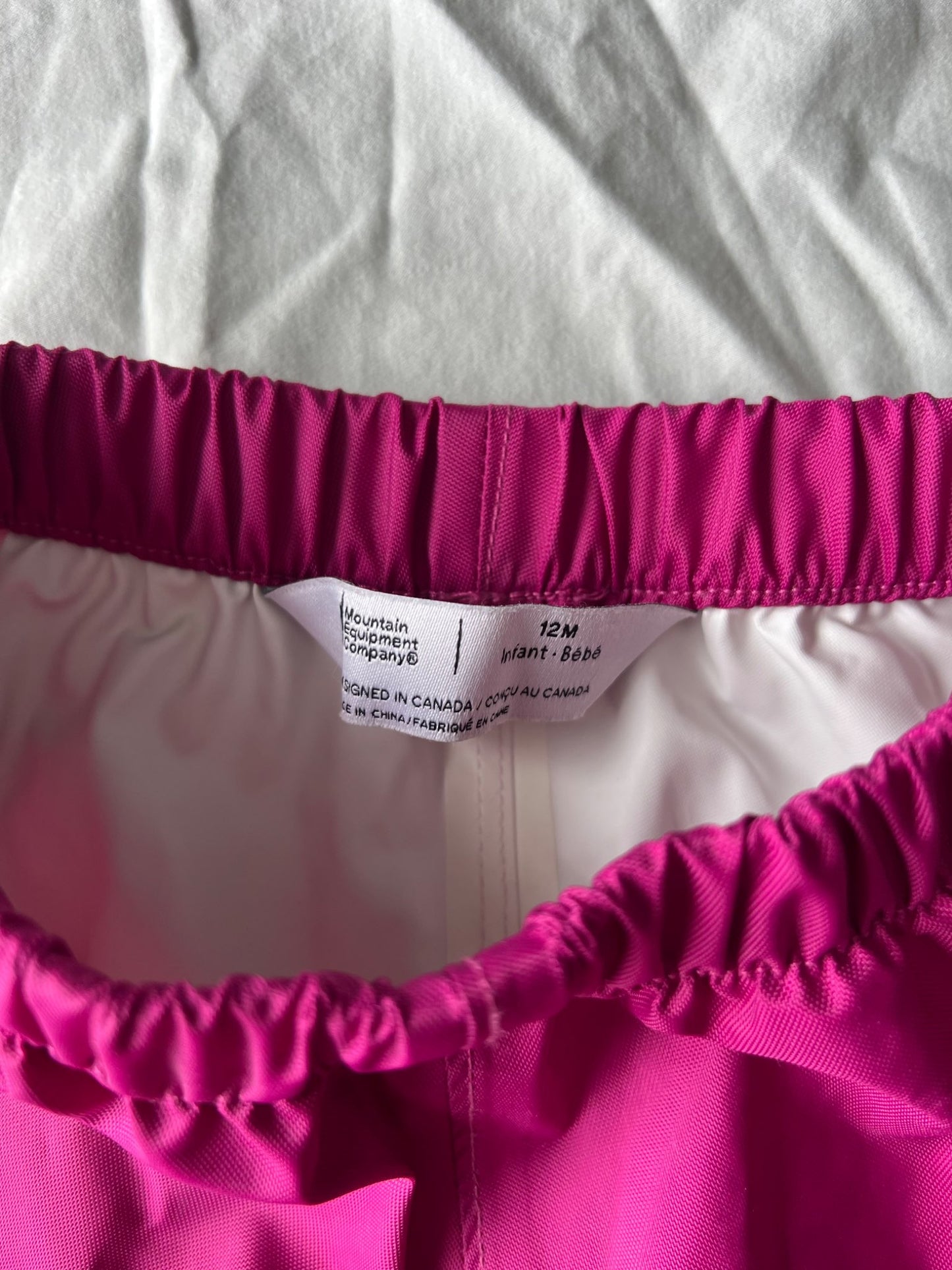 MEC rain pants 12m. Retails $35, Kids 12 Month (9-12M)