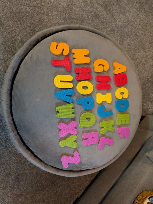 Foam bath letters and sea creature shapes