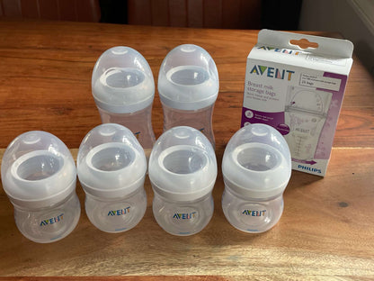 Set of 6 AVENT bottles and a NEW Unopened Box of Breast Milk Storage Bags