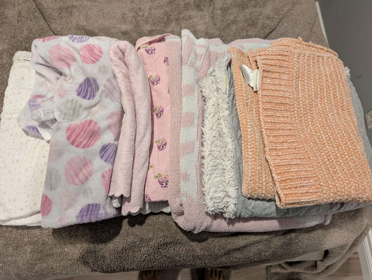 7 pink/purple crib blankets
