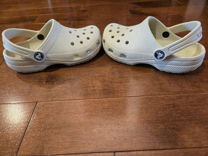 Crocs classic kids' clogs (ivory/beige) - RRP $50, Shoes 12 (Toddler:2-4yr)