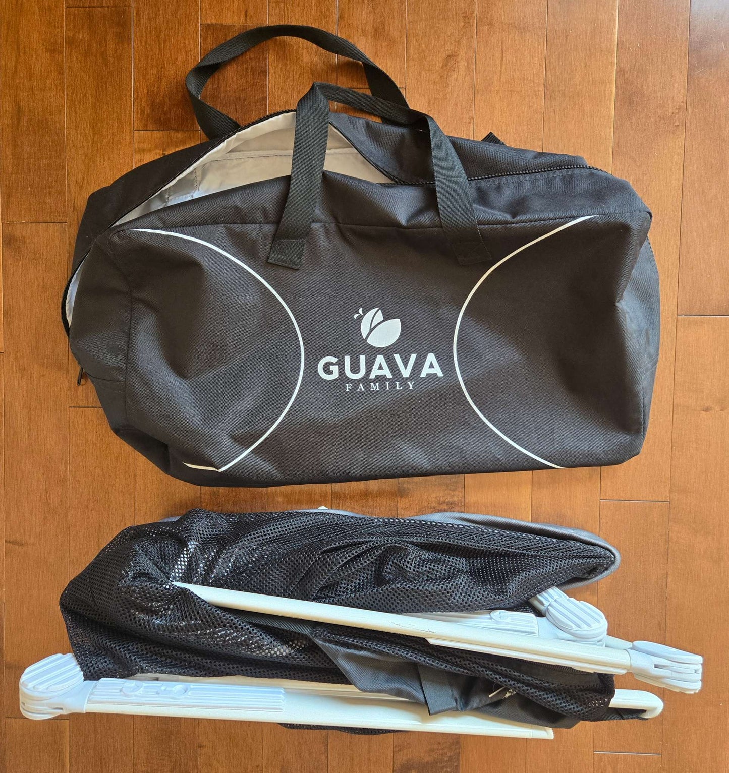 Guava Family "Lotus" Travel Crib + Guava Family fitted crib sheet  (together retail for approx. $325 USD)