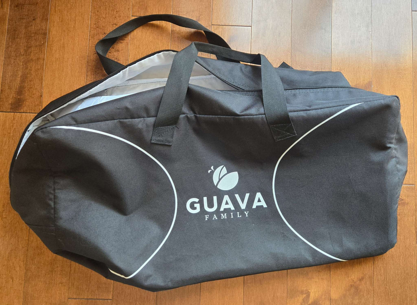 Guava Family "Lotus" Travel Crib + Guava Family fitted crib sheet  (together retail for approx. $325 USD)