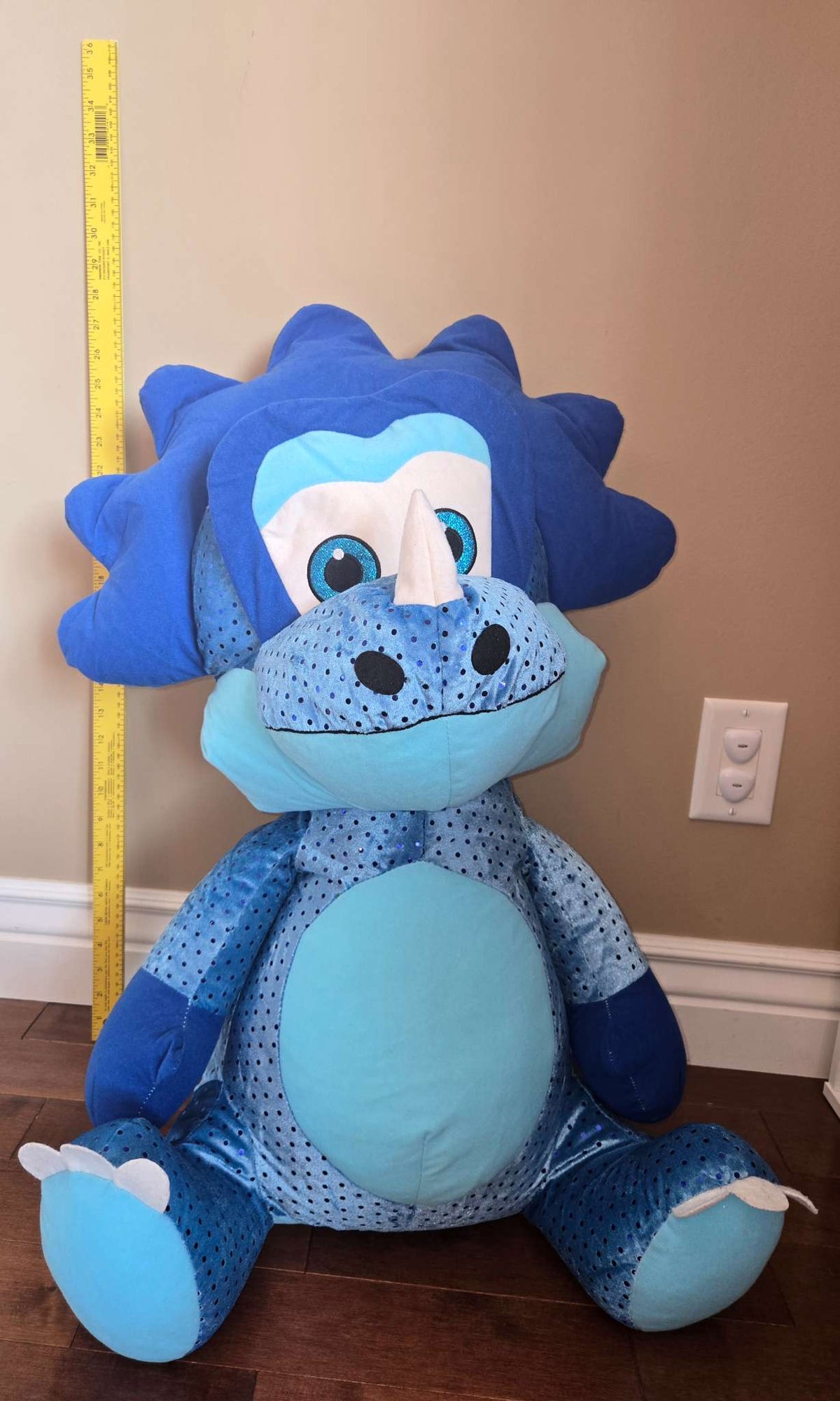 Large blue triceratops plushie