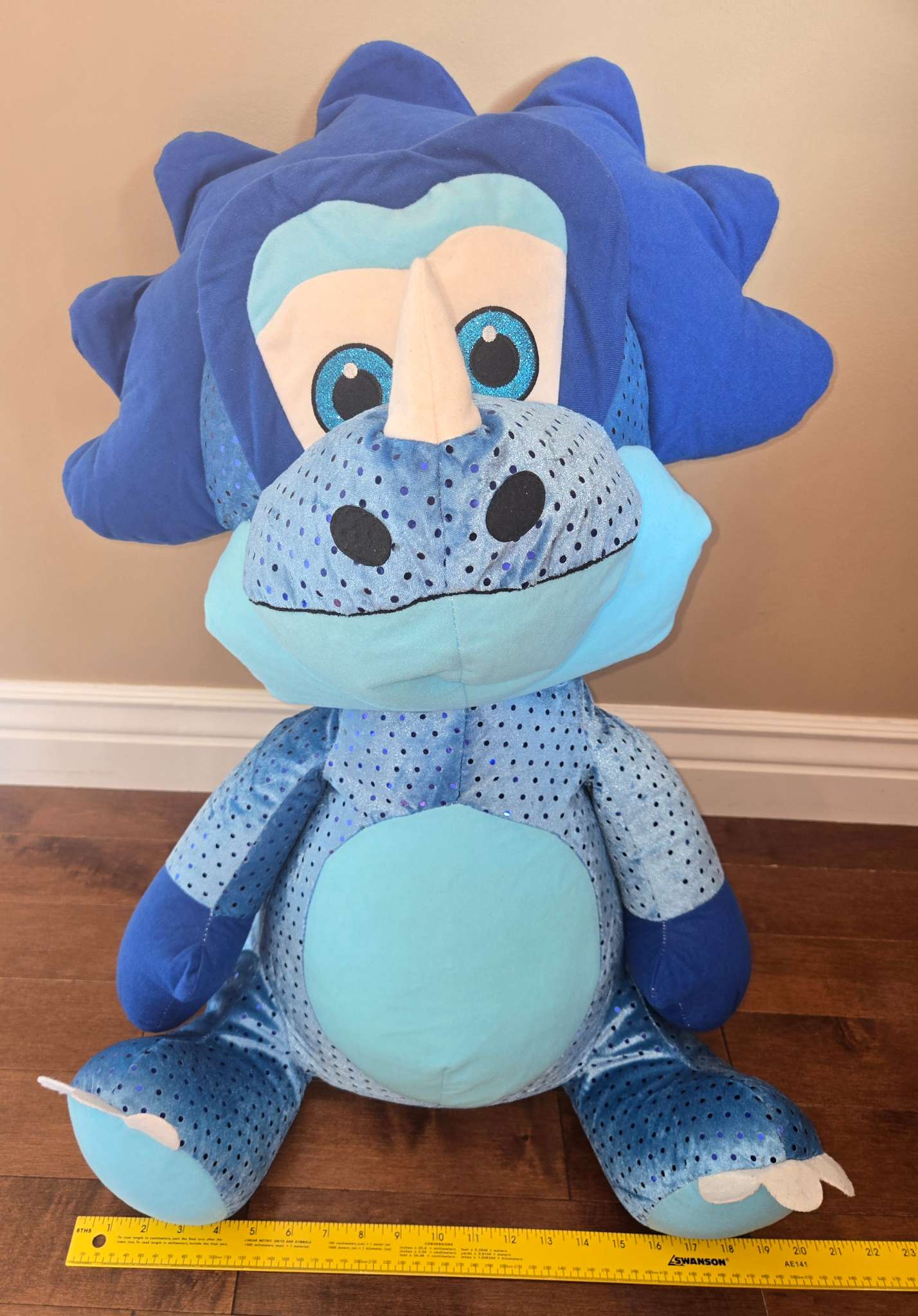 Large blue triceratops plushie