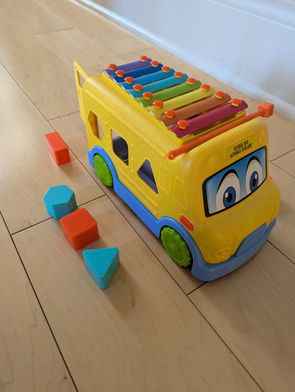 School bus with matching shapes and xylophone