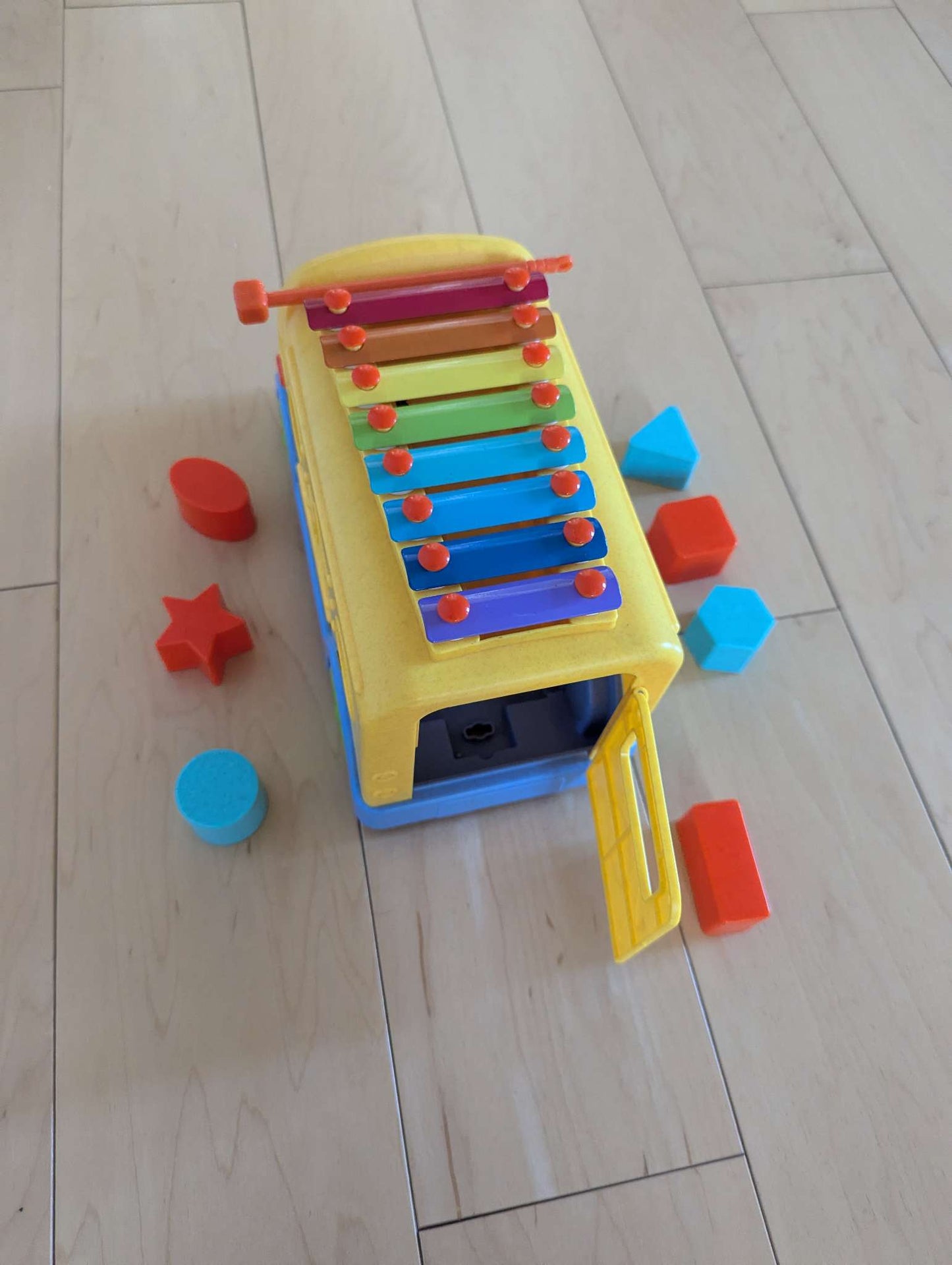 School bus with matching shapes and xylophone