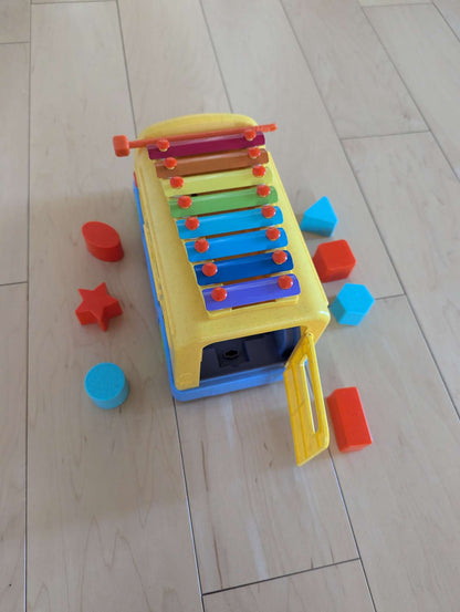 School bus with matching shapes and xylophone