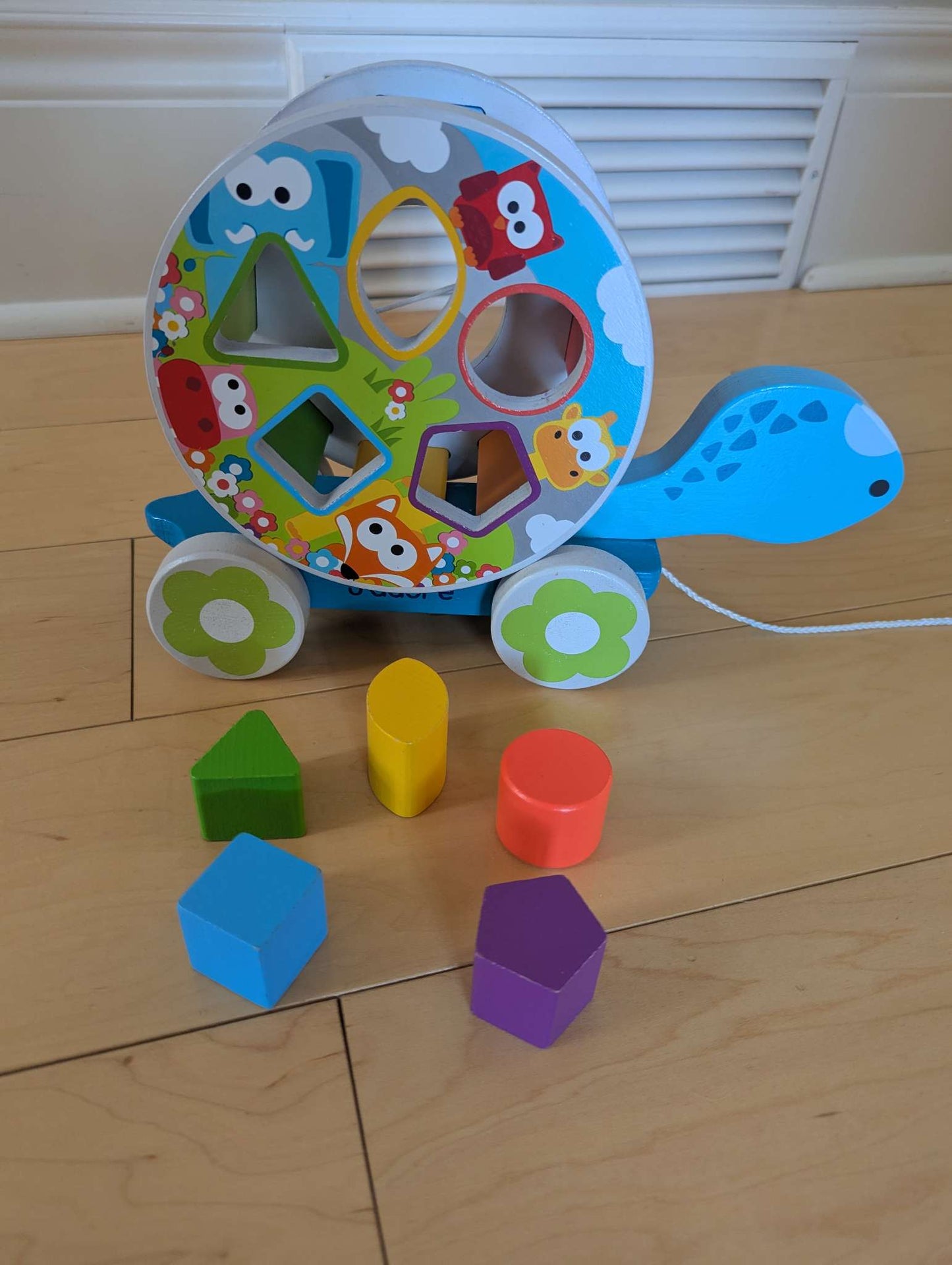 Wood walk along / shape matching snail toy retails for $40+