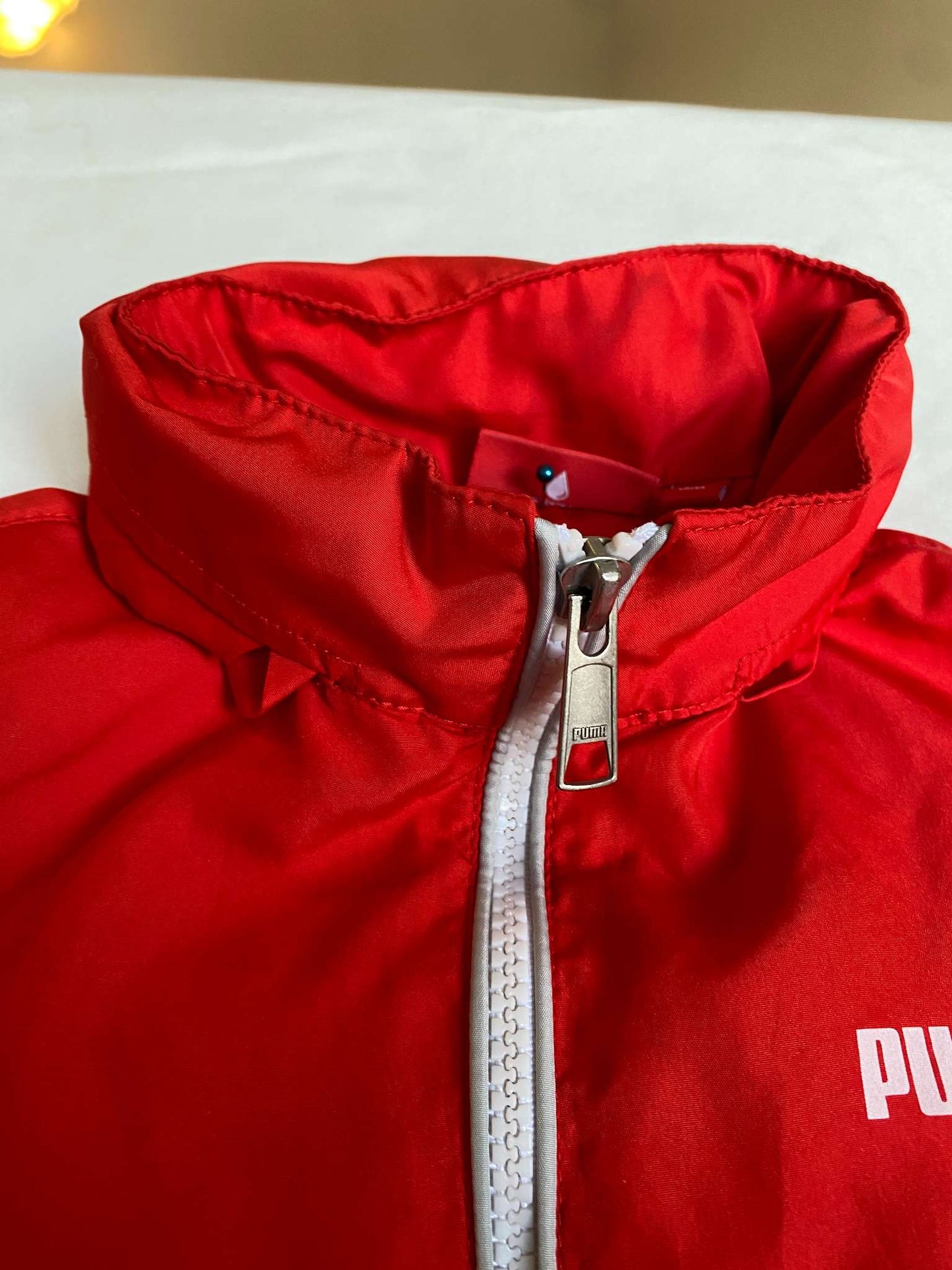 Puma Red Windbreaker with roll up hood and stow pouch Sz 5T (MSRP 60), Kids 5/5T