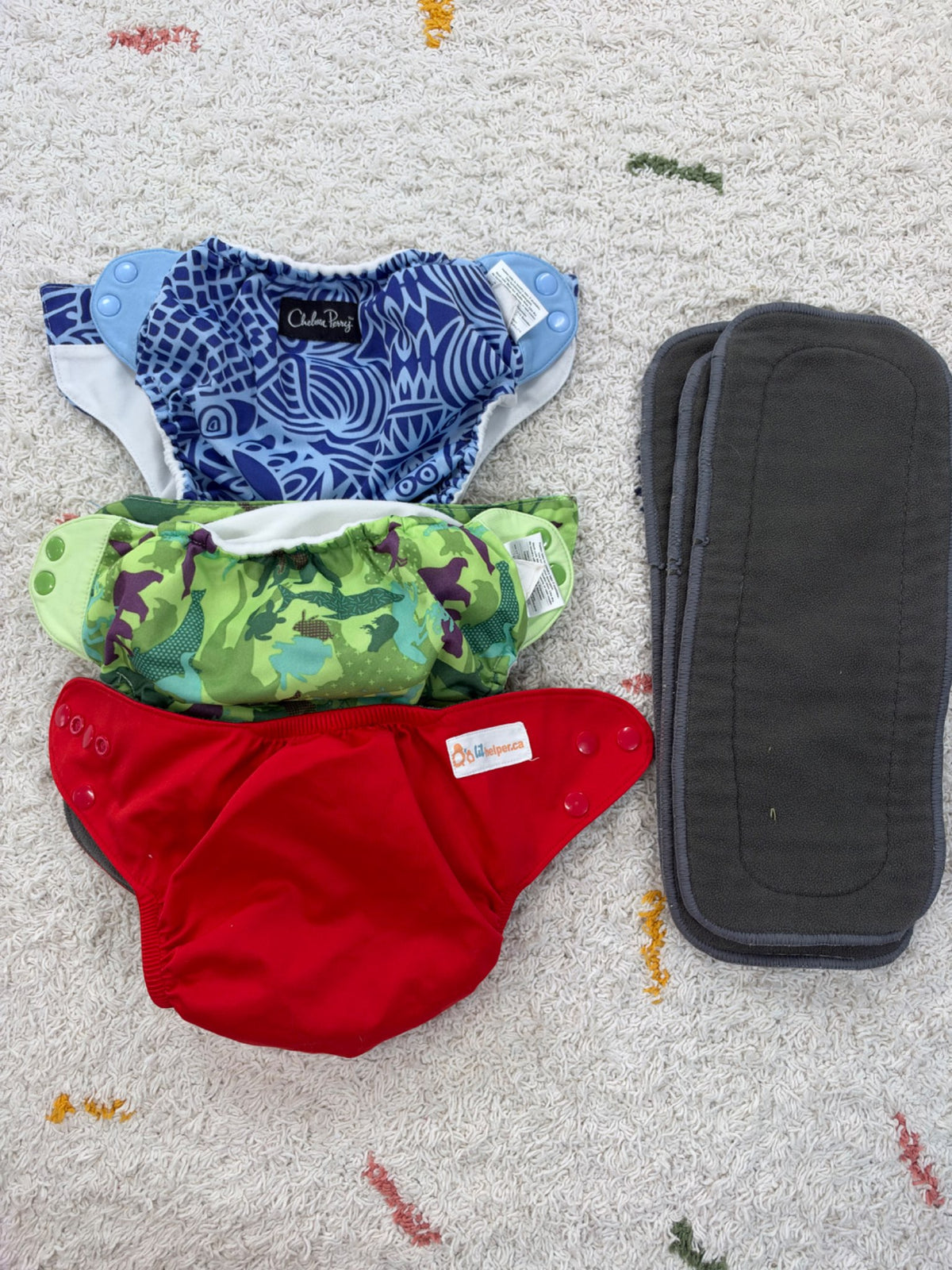 Cloth diapers with inserts