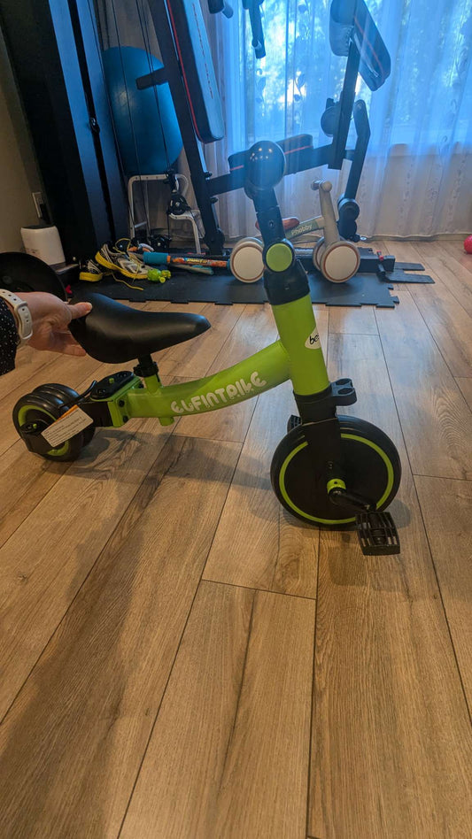 2 Toddler bikes - one with adjustable back wheels